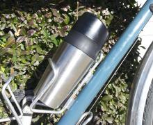 OXO Good Grips LiquiSeal Travel Mug in a bottle cage.